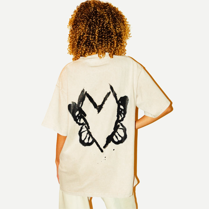 Hearts Evolve | Universal Apricot Tee